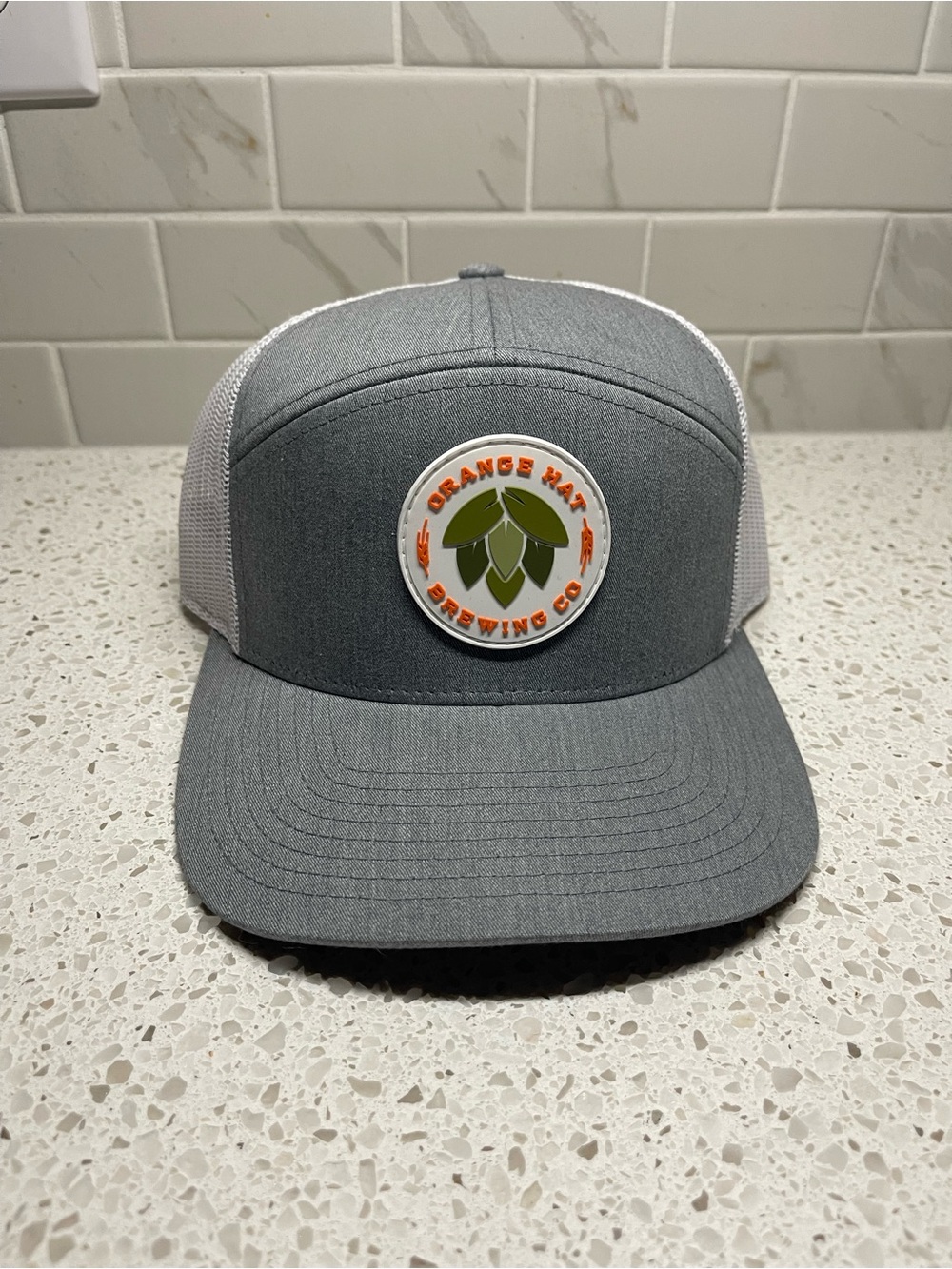 Orange hat brewery hat